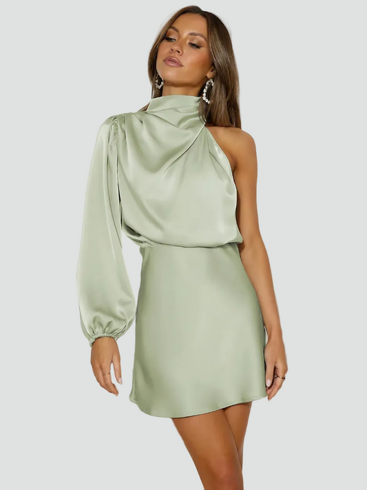 Cocktailkjole til damer med asymmetrisk hals og draperet look