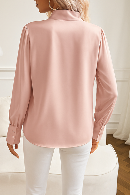 Damebluse med satin look sløjfe i halsen og lange ærmer