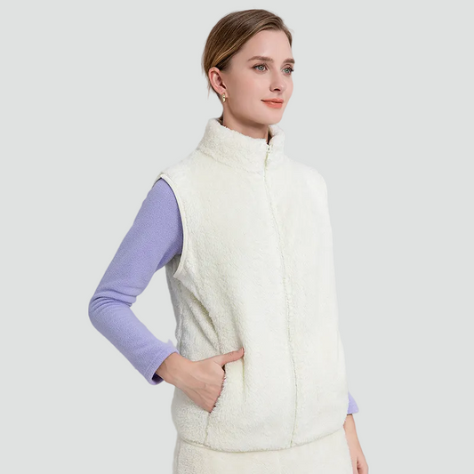 Blød teddy bodywarmer til dame med høj krave og lynlås